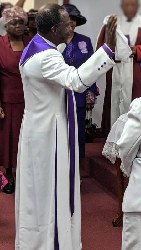 Bishop Wallace in worship